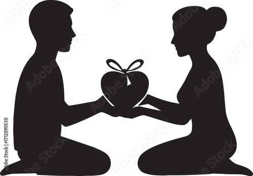 Couple in love exchanging heart shaped gift silhouette