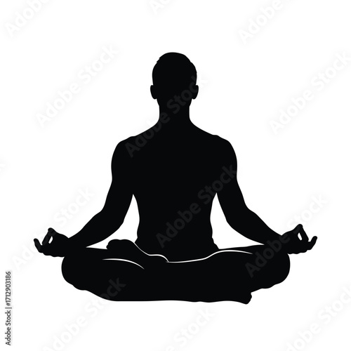 A person meditating in the lotus position a striking black silhouette