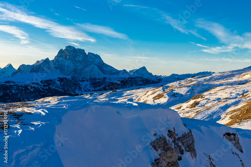 Dolomites mountains in winter, Alpi Dolomiti beautiful scenic landscape in summer. Italian Alps mountain summits and rocky tower peaks above green valley alpine scene near Cortina'd'Amprezzo