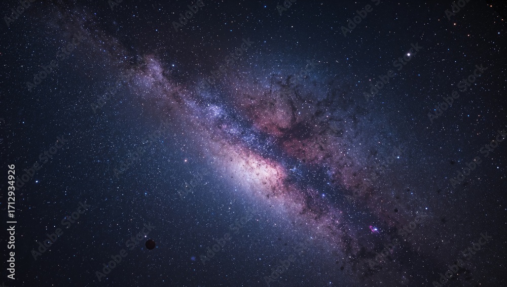 Fototapeta premium Wide-angle cosmic view of the galaxy featuring numerous stars against a dark night backdrop.
