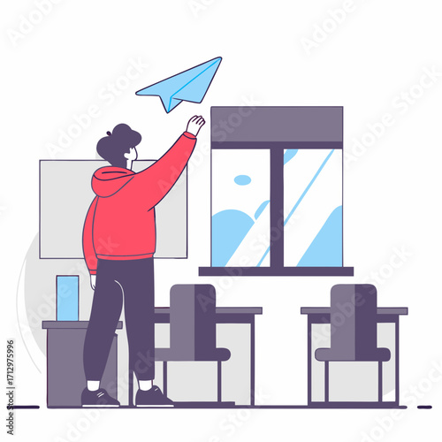 Young boy throwing paper airplane in classroom with window view  