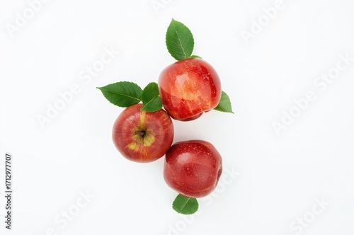 Three mature red apples iso...