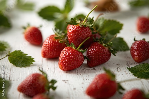 Red berries scattered on a ...