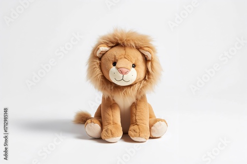 Plush lion toy on a plain w...