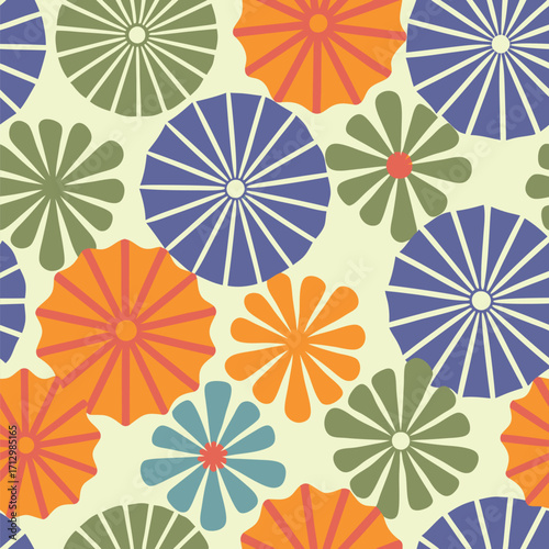 A seamless repeating pattern of stylized chrysanthemum flowers in coral, teal, and orange hues on a pale yellow background.