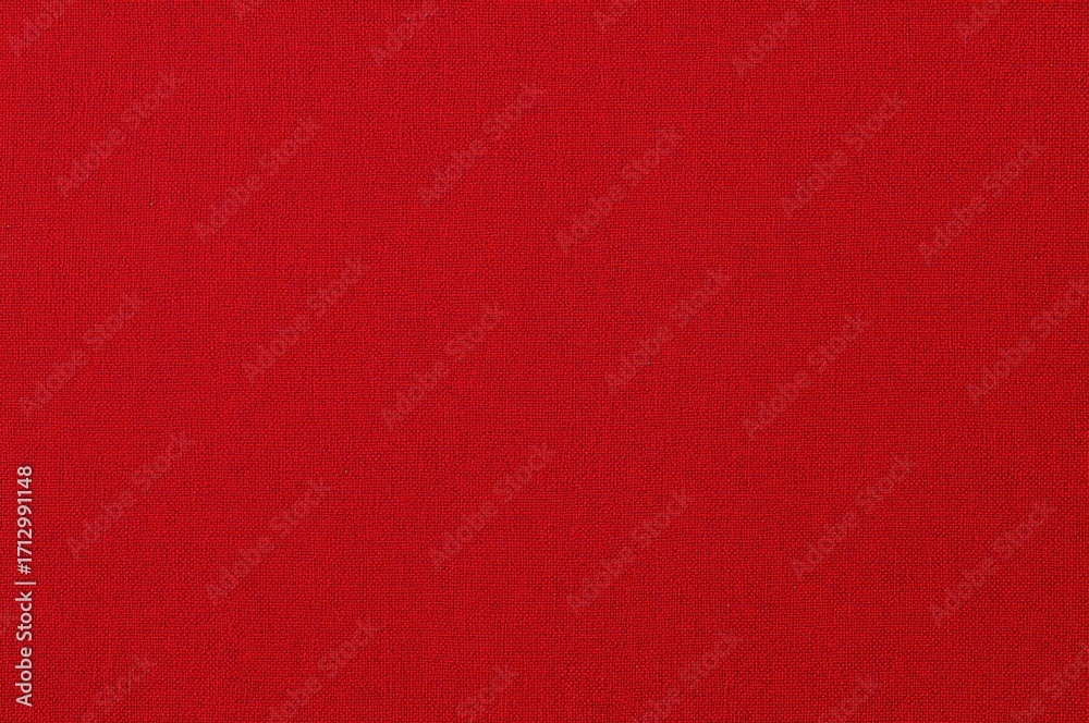 Fototapeta premium Close-up of red natural fabric texture made from cotton or linen, ideal for upholstery and decoration