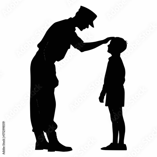 Silhouette of a police officer placing his hand on the head of a young boy in a supportive gesture
