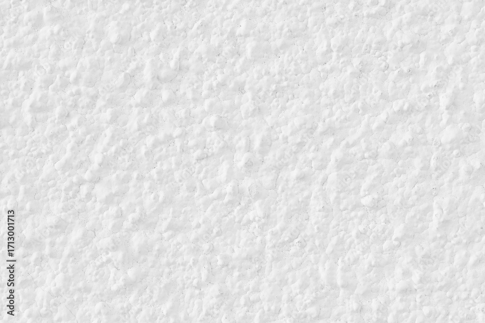 Fototapeta premium White concrete wall texture background. Uneven render stucco white painted concrete wall texture background. Rough and grunge wall in the sun.