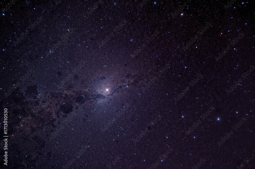 Fototapeta premium Celestial scene featuring a comet, star clusters, cosmic dust, and the Milky Way captured through a specialized astrophotography telescope.