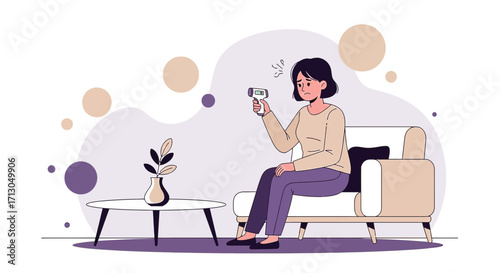 Worried woman taking her temperature at home using an infrared thermometer, health concept related