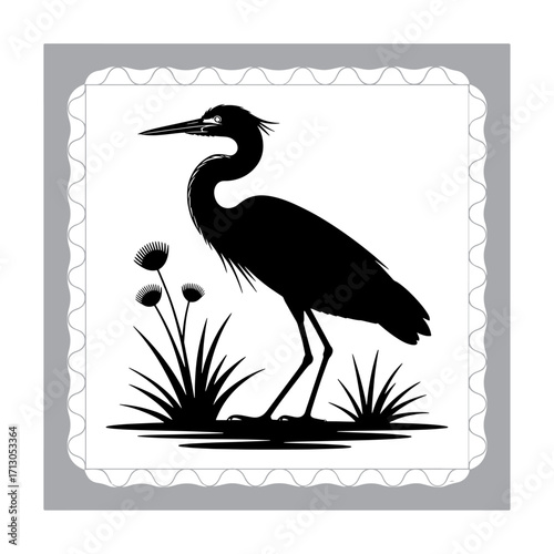 Black and White Heron Silhouette in a Marsh with Reeds Reflected in the Water Creating a Serene Wildlife Scene