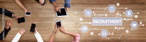 Foto A top-down view of diverse hands using digital devices during the recruitment process