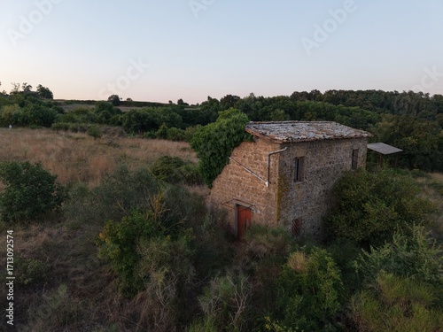 Rural landscape with stone house and vegetation, Lake Bolsena region