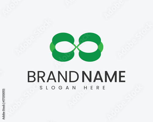 Green Infinity Symbol Logo with Brand Name and Slogan on White Background Keywords: infinity symbol, green logo, abstract logo, branding, brand name, slogan, logo design, symbol, icon, connection
