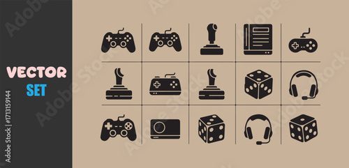 Collection of video game controllers joysticks and accessories on a beige background