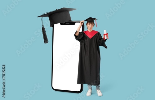Male graduating student and...