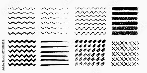 Collection of hand drawn black ink brush stroke patterns and textures on white background
