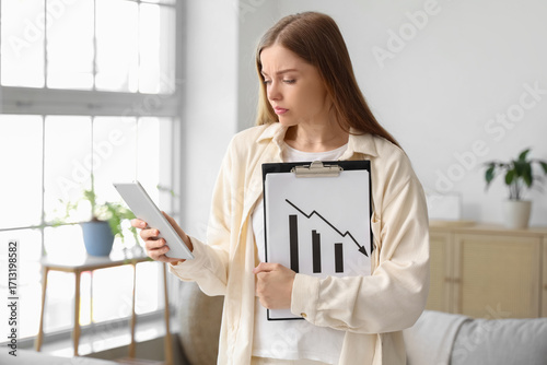 Bankrupt young woman with t...