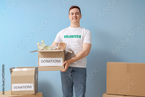 Male volunteer with donatio...
