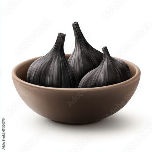 Wallpaper Mural A serene bowl holding three elegant, black-hued decorative items, showcasing unique textures and curves in a minimalist style. Torontodigital.ca