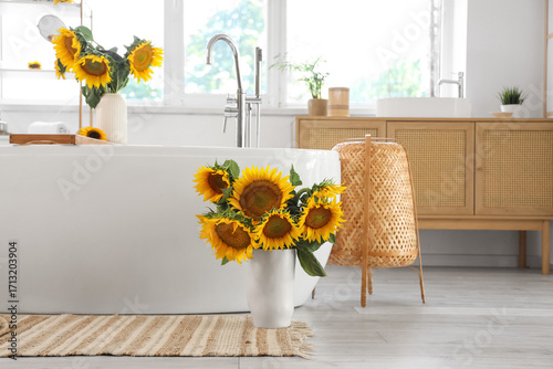 Vase with beautiful sunflow...