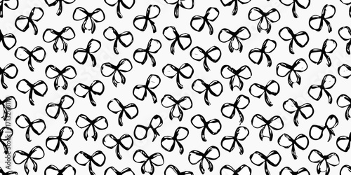 Hand drawn black bow tie pattern on a white background seamless texture