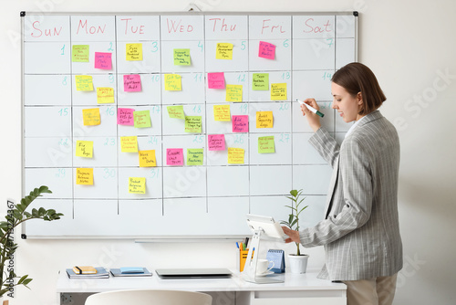 Young businesswoman with ta...