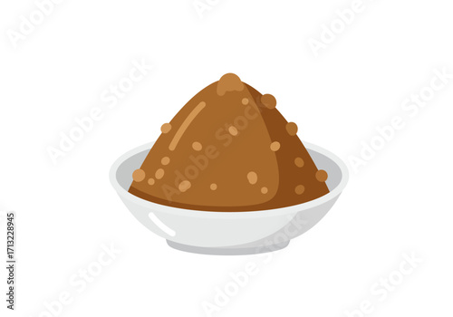 A mound of brown powder in a white bowl