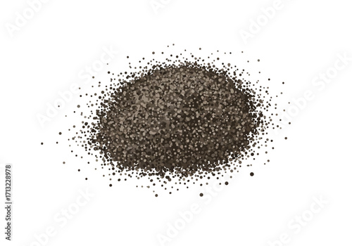 A mound of small irregularly shaped dark brown and tan particles scattered around a central heap