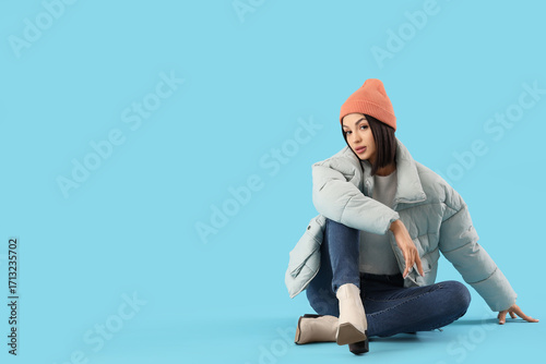 Young woman in stylish puff...