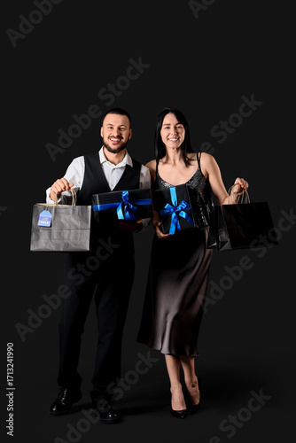 Young couple with shopping ...