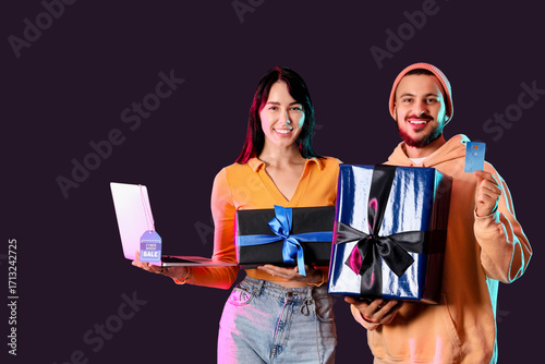 Young couple with credit ca...