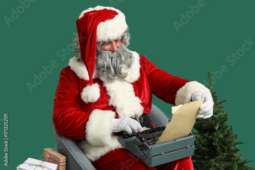 Santa claus typing christma...