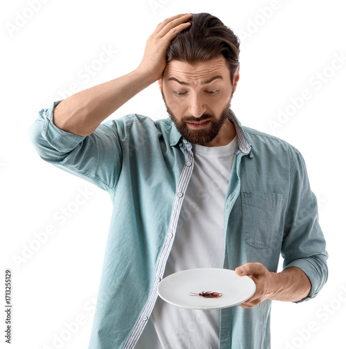 Shocked young man holding p...