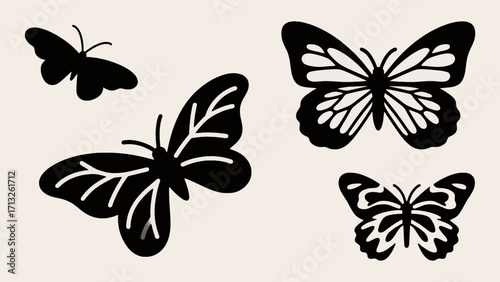 Four black butterfly silhouettes vector illustration with diverse wing patterns