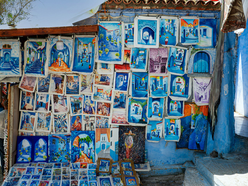 Colorful paintings for sale in the medina of Chefchaouen, Morocco