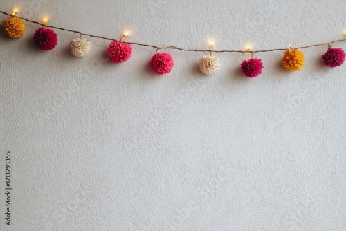 Modern plain wall decorated with a small Deepavali garland in a clean minimalist style.