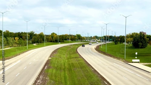 Cars driving on wide highway