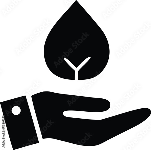 Hand holding a water drop with a tree inside symbolizing nature conservation and water care for a sustainable future.