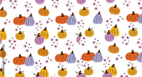 Colorful pumpkins and flowers create a warm, inviting autumn pattern for seasonal designs