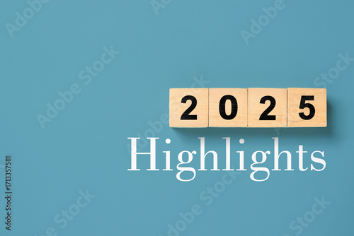 2025 Highlights inscription on grey background. Major events, overview, looking back at 2025 year concept.