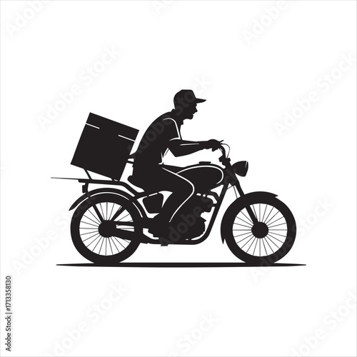 silhouette of a man riding a motorcycle