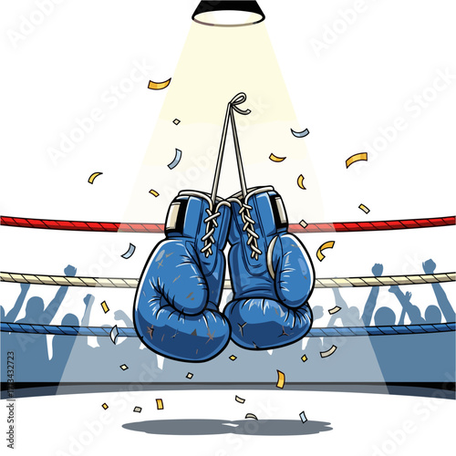 Boxing gloves hanging in spotlight above ring