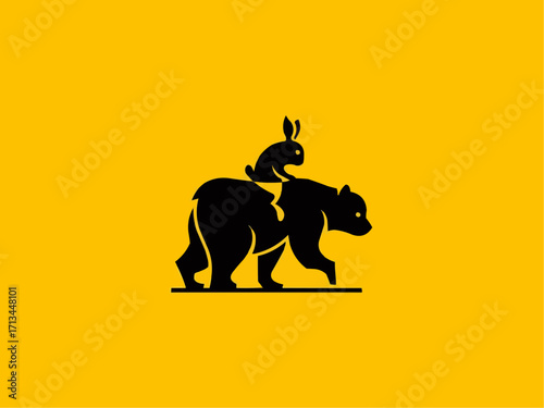 Charming black silhouette of a bear carrying a rabbit on its back, symbolizing cooperation and friendship.