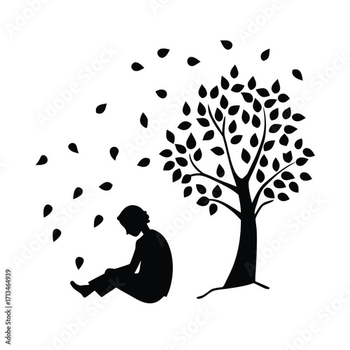 Silhouette of person sitting under a tree with falling leaves
