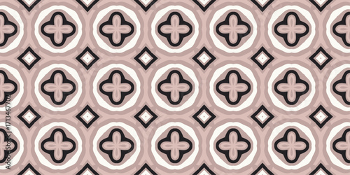 A repeating geometric pattern featuring stylized quatrefoil shapes enclosed within circles and interspersed with diamonds on a muted pink background.