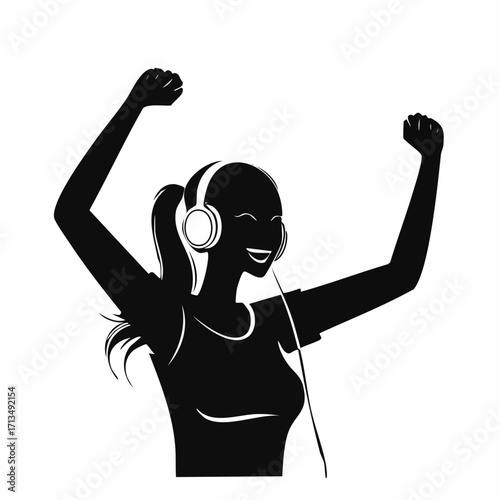 Cheerful woman listening to music with headphones dancing with joy and freedom, modern lifestyle