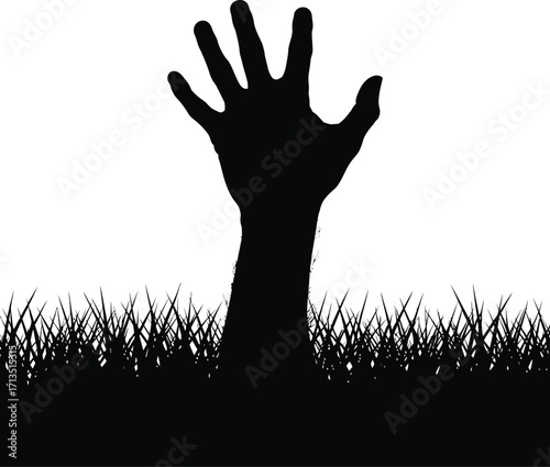 Black hand emerging from grass silhouette