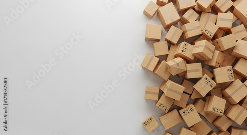 Numerous small cardboard boxes scattered on a plain white surface, creating a visual texture.
