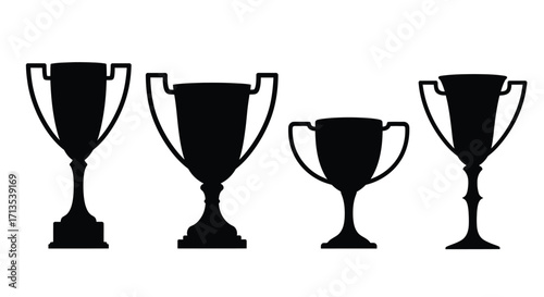 Silhouette collection of four different trophy cups representing achievement and victory vector